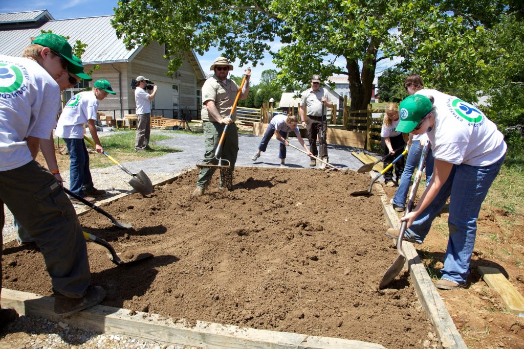 men working on gardening